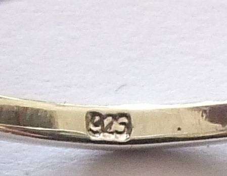 A stunning Solid Sterling Silver ring with an Eye catching Onyx look inset !! No Combining Fees !!