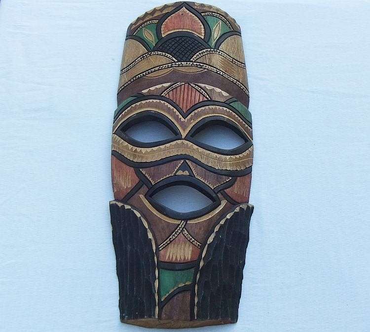 What a find !! A large and colorful Vintage carved solid wood Traditional African mask !!