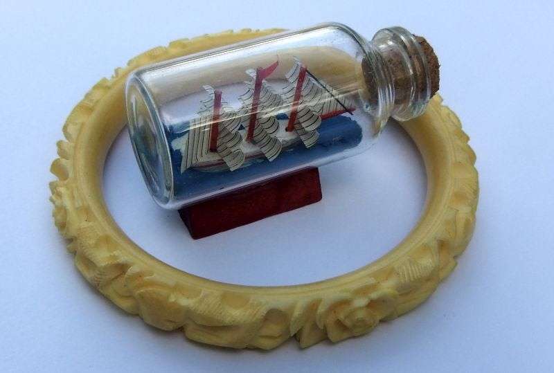 FOR HIM & HER !! A CUTE BOAT IN A BOTTLE AND A VINTAGE CARVED BONE BANGLE !! BID FOR BOTH !!