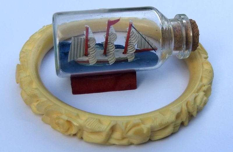FOR HIM & HER !! A CUTE BOAT IN A BOTTLE AND A VINTAGE CARVED BONE BANGLE !! BID FOR BOTH !!