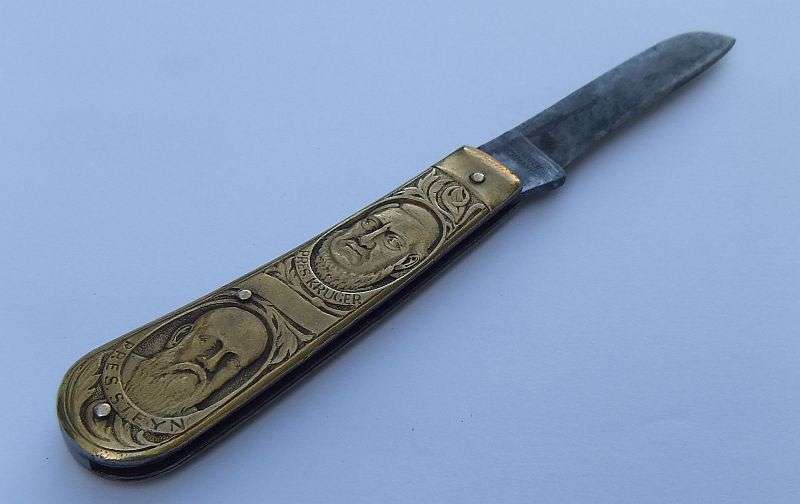 A RARE 1961 REP OF SA POCKET KNIFE FEATURING PAUL KRUGER AND WINDHOEK KNIFE MAKER A.ROSENTHAL
