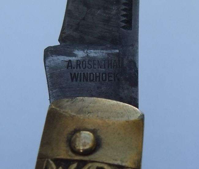 A RARE 1961 REP OF SA POCKET KNIFE FEATURING PAUL KRUGER AND WINDHOEK KNIFE MAKER A.ROSENTHAL