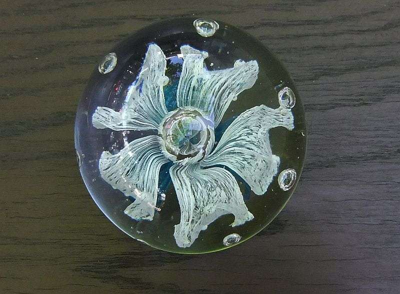 A GORGEOUS VINTAGE SOLID GLASS PAPERWEIGHT WITH INTERNAL FLOWER MOTIF AND BUBBLES !! HEAVY PIECE !!