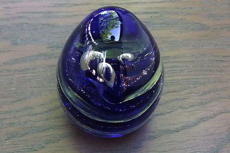 A MAGNIFICENT HEAVY VINTAGE SOLID GLASS CONICAL SHAPED PAPERWEIGHT WITH AMAZING SWIRLS OF COLOR !!