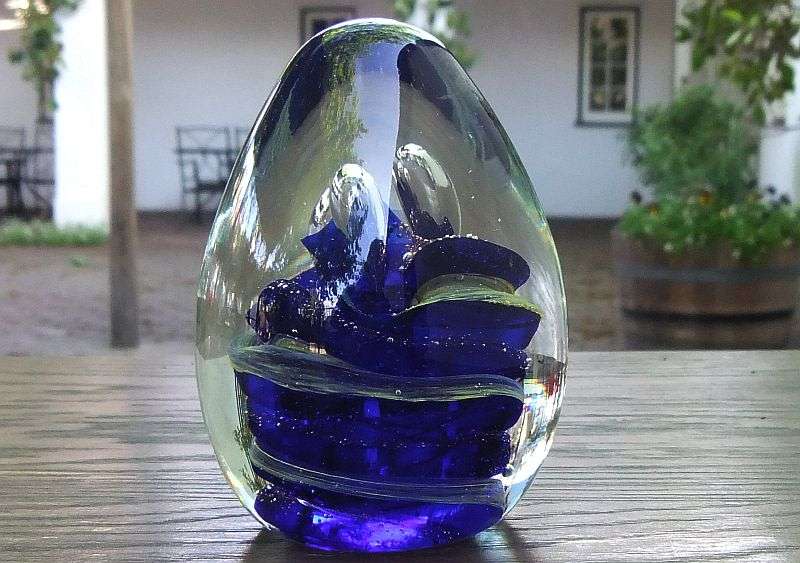 A MAGNIFICENT HEAVY VINTAGE SOLID GLASS CONICAL SHAPED PAPERWEIGHT WITH AMAZING SWIRLS OF COLOR !!