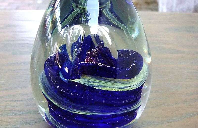 A MAGNIFICENT HEAVY VINTAGE SOLID GLASS CONICAL SHAPED PAPERWEIGHT WITH AMAZING SWIRLS OF COLOR !!