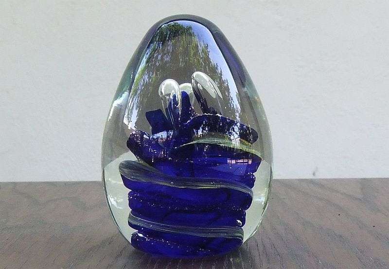 A MAGNIFICENT HEAVY VINTAGE SOLID GLASS CONICAL SHAPED PAPERWEIGHT WITH AMAZING SWIRLS OF COLOR !!