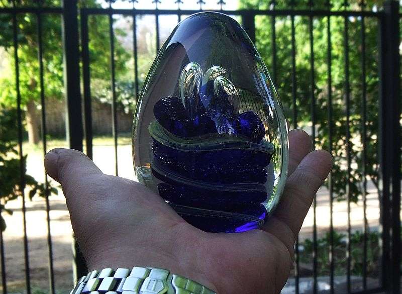 A MAGNIFICENT HEAVY VINTAGE SOLID GLASS CONICAL SHAPED PAPERWEIGHT WITH AMAZING SWIRLS OF COLOR !!