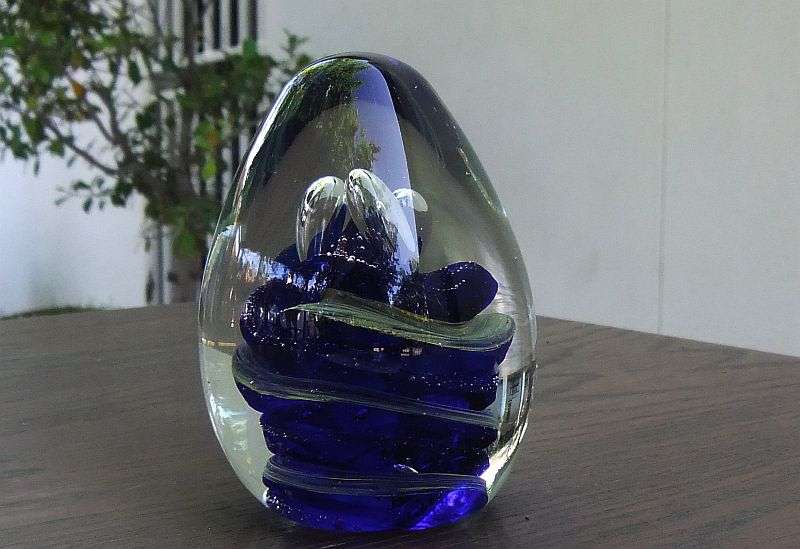 A MAGNIFICENT HEAVY VINTAGE SOLID GLASS CONICAL SHAPED PAPERWEIGHT WITH AMAZING SWIRLS OF COLOR !!