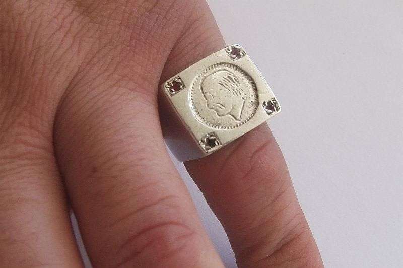 A TOTALLY COOL SOLID STERLING SILVER COIN RING SET WITH FOUR FACETED RED STONES !! WOW !!