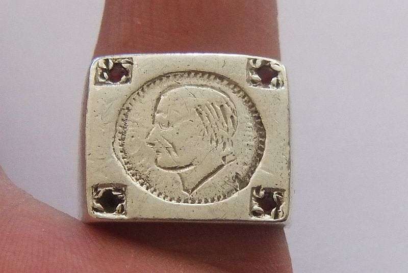 A TOTALLY COOL SOLID STERLING SILVER COIN RING SET WITH FOUR FACETED RED STONES !! WOW !!