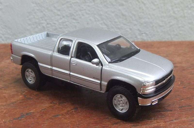 NICE !! A DETAILED DIE CAST METAL 1:48 SCALE MODEL OF THE "" FORD SILVERADO "" WITH OPENING DOORS !!