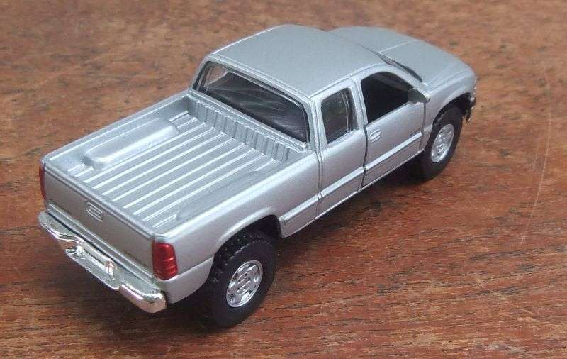 NICE !! A DETAILED DIE CAST METAL 1:48 SCALE MODEL OF THE "" FORD SILVERADO "" WITH OPENING DOORS !!