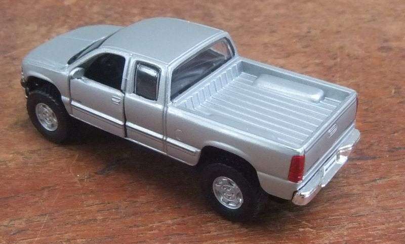 NICE !! A DETAILED DIE CAST METAL 1:48 SCALE MODEL OF THE "" FORD SILVERADO "" WITH OPENING DOORS !!