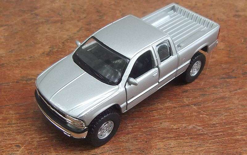 NICE !! A DETAILED DIE CAST METAL 1:48 SCALE MODEL OF THE "" FORD SILVERADO "" WITH OPENING DOORS !!