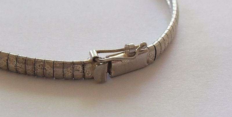 A VERY SMART UNUSUAL SOLID STERLING SILVER BRACELET WITH SAFETY CATCH CLASP !! CHECK IT OUT !!