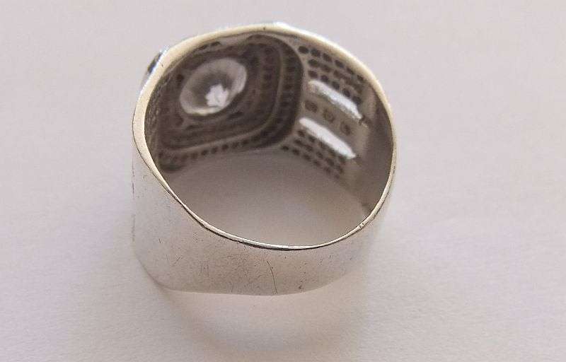 A GREAT QUALITY BIG , BOLD , BEAUTIFUL SOLID STERLING SILVER RING SET WITH A BIG FACETED CZ STONE