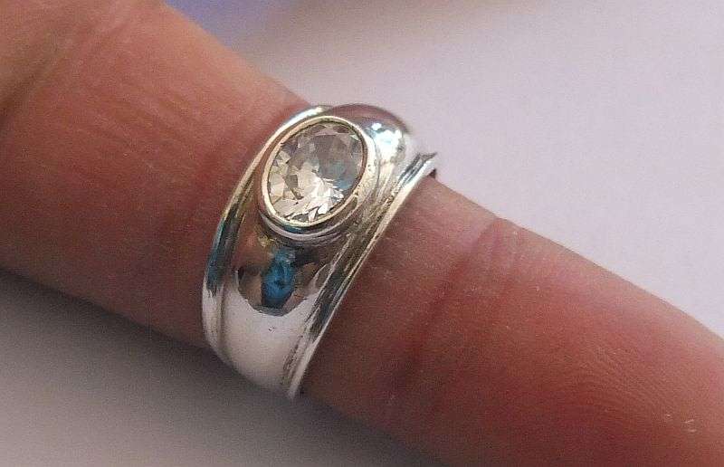 WOW !! A SUPERIOR QUALITY SOLID STERLING SILVER RING SET WITH A GORGEOUSLY FACETED STONE !!