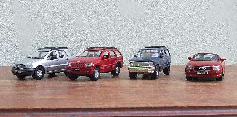 LOT OF 4 DIE CAST MODELS !! MERCEDES ML320 , JEEP GRAND CHEROKEE , FORD EXPLORER , AUDI TT ROADSTER
