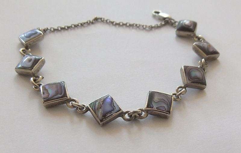 AN ABSOLUTELY STUNNING VINTAGE STERLING SILVER DESIGNER BRACELET SET WITH ABALONE !! WOW WOW !!