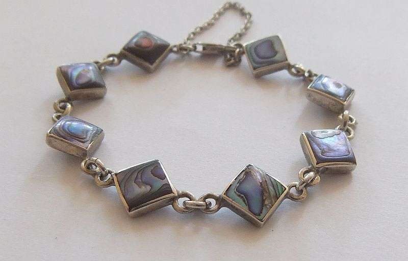 AN ABSOLUTELY STUNNING VINTAGE STERLING SILVER DESIGNER BRACELET SET WITH ABALONE !! WOW WOW !!