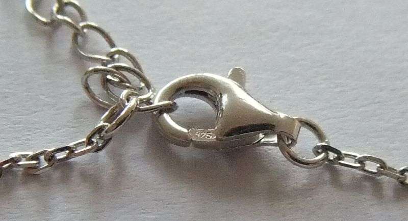 A PETITE YET ELEGANT SOLID STERLING SILVER BRACELET SET WITH 3 FACETED BLUE STONES !! BRAND NEW !!