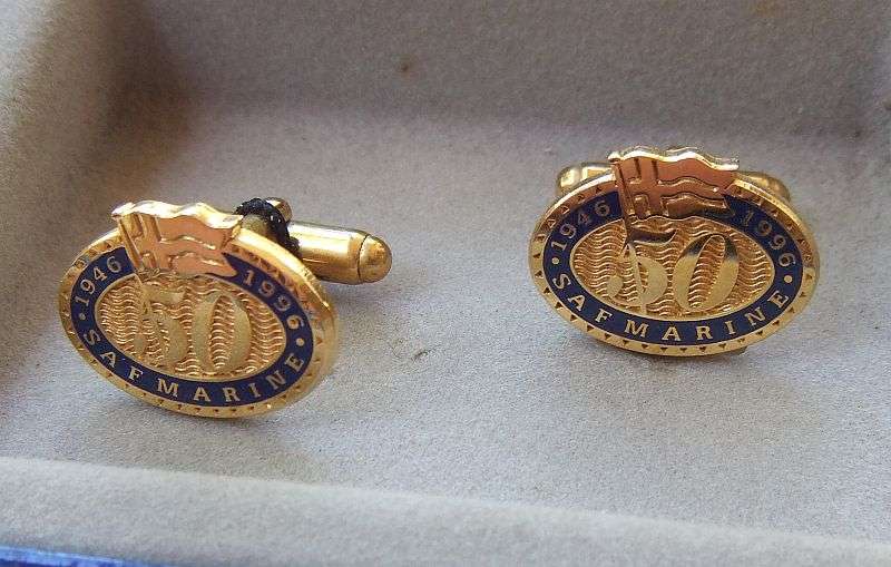 A PAIR OF VINTAGE CUFFLINKS MADE FOR SAFMARINE 50 YEAR ANNIVERSARY