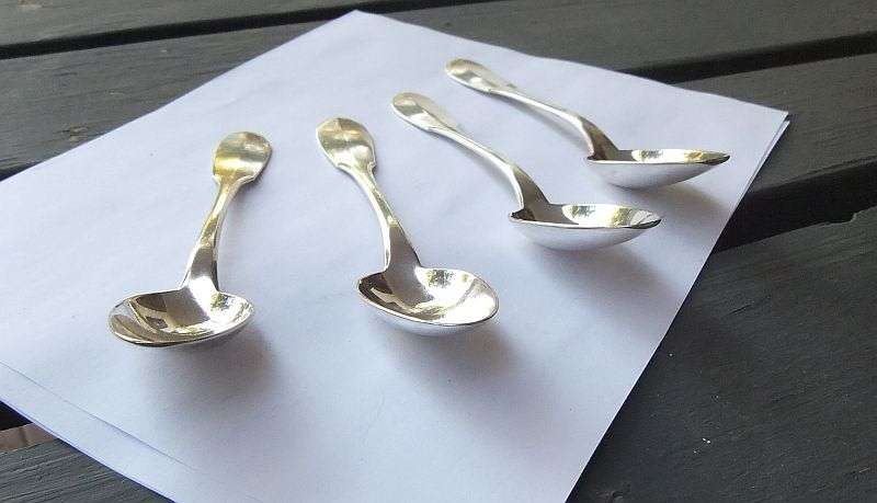 4 MEDIUM SIZED SPOONS BY CHRISTOFLE OF FRANCE