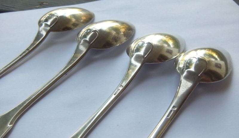4 MEDIUM SIZED SPOONS BY CHRISTOFLE OF FRANCE