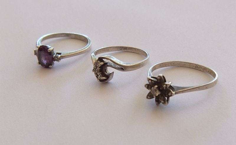 SUPER DEAL !! THREE STYLISH SOLID STERLING SILVER RINGS ... FACETED PURPLE STONE , CLUSTER ETC !!