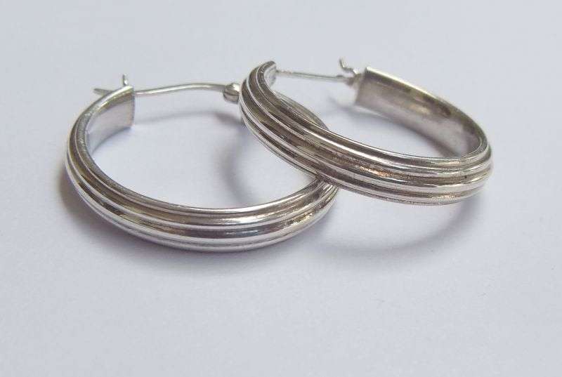 A CLASSY PAIR OF STERLING SILVER HOOP EARRINGS WITH STRIPE PATTERN AND HINGED CLIPS FOR SAFETY !!
