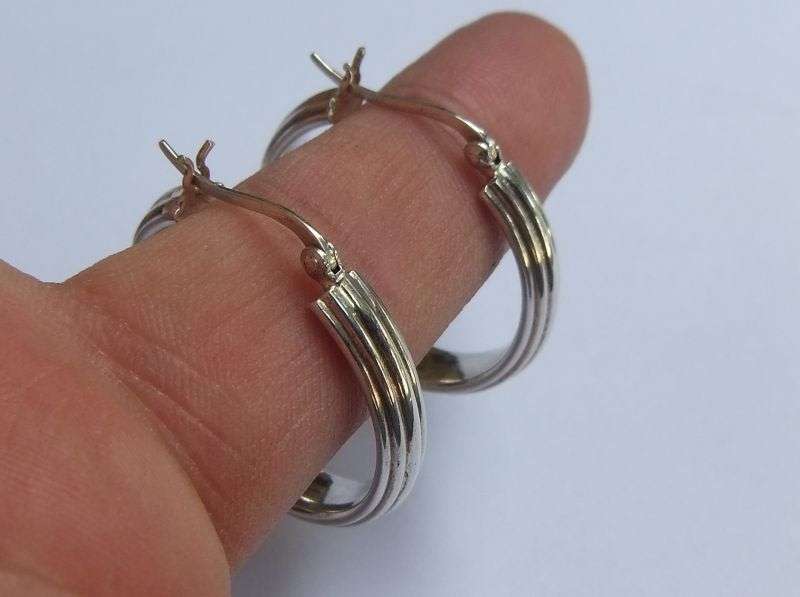 A CLASSY PAIR OF STERLING SILVER HOOP EARRINGS WITH STRIPE PATTERN AND HINGED CLIPS FOR SAFETY !!