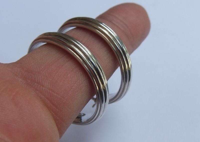 A CLASSY PAIR OF STERLING SILVER HOOP EARRINGS WITH STRIPE PATTERN AND HINGED CLIPS FOR SAFETY !!