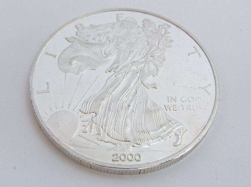 EXCELLENT INVESTMENT !! A MILLENNIUM EDITION 1 OUNCE FINE SILVER DOLLAR COIN !! 999.9 % PURE
