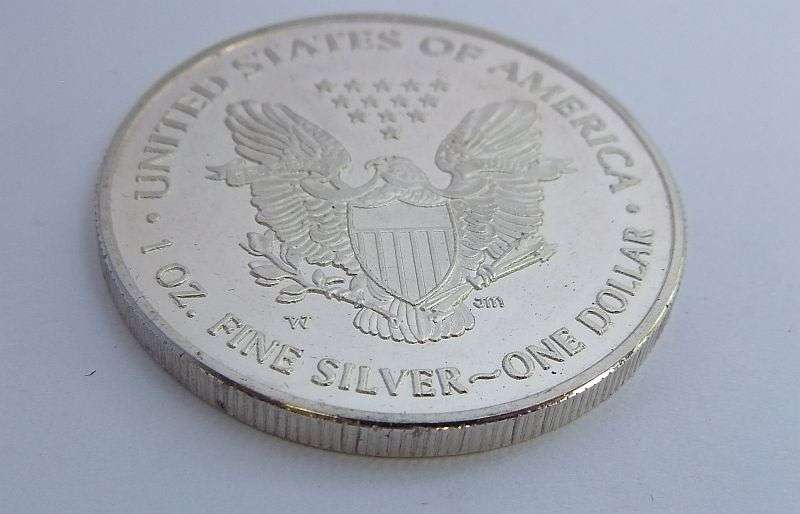 EXCELLENT INVESTMENT !! A MILLENNIUM EDITION 1 OUNCE FINE SILVER DOLLAR COIN !! 999.9 % PURE