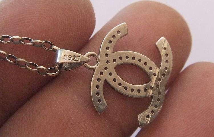 A STYLISH ""CC"" STERLING SILVER PENDANT SET WITH FACETED CLEAR STONES PLUS STERLING NECKLACE !! WOW