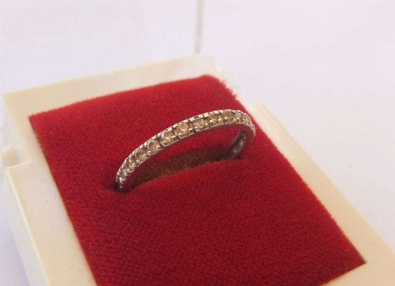 AN ELEGANT SOLID STERLING SILVER HALF ETERNITY RING TO ACCENTUATE YOUR OTHER BEAUTIFUL PIECES !!