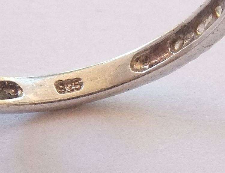 AN ELEGANT SOLID STERLING SILVER HALF ETERNITY RING TO ACCENTUATE YOUR OTHER BEAUTIFUL PIECES !!