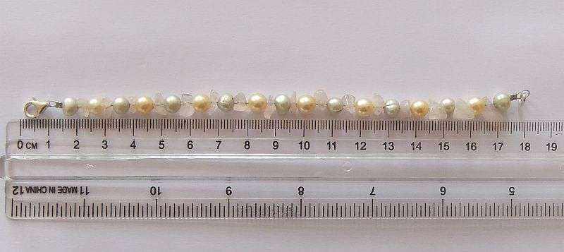 A GENUINE AKOYA PEARL , ROSE QUARTZ AND OTHER FRESHWATER PEARL BRACELET WITH STERLING SILVER CLASP