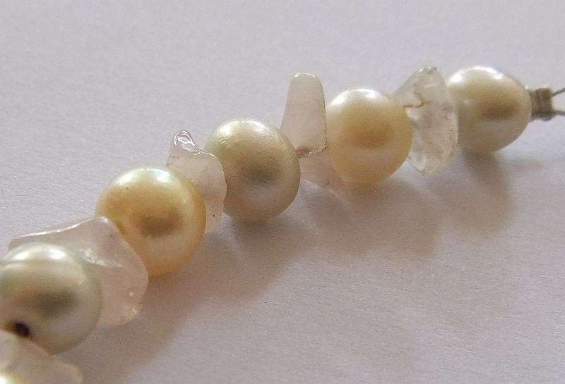 A GENUINE AKOYA PEARL , ROSE QUARTZ AND OTHER FRESHWATER PEARL BRACELET WITH STERLING SILVER CLASP