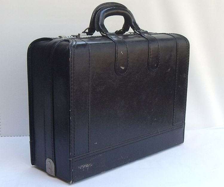 A VERY USEFUL VINTAGE GENUINE LEATHER DOCTORS BRIEFCASE WITH " HIDDEN " COMPARTMENT ...SO COOL !!