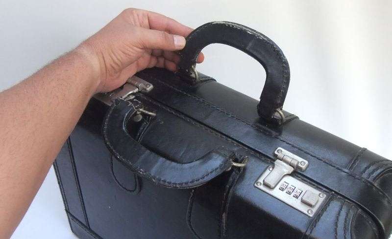 A VERY USEFUL VINTAGE GENUINE LEATHER DOCTORS BRIEFCASE WITH " HIDDEN " COMPARTMENT ...SO COOL !!