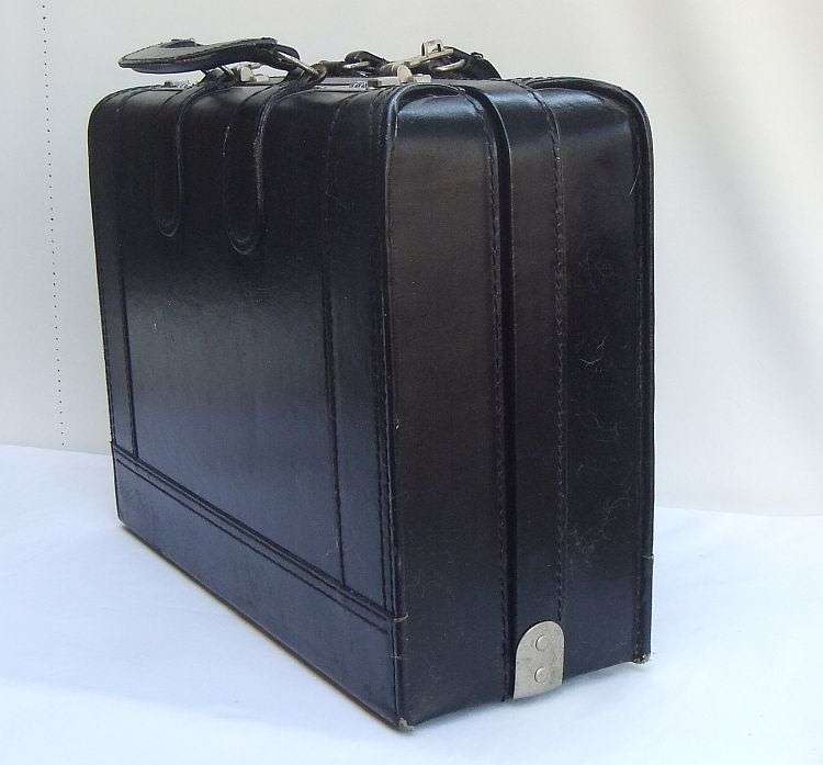 A VERY USEFUL VINTAGE GENUINE LEATHER DOCTORS BRIEFCASE WITH " HIDDEN " COMPARTMENT ...SO COOL !!