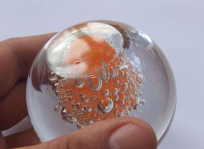 A DAMAGE FREE VINTAGE GENUINE MURANO SOLID GLASS PAPERWEIGHT WITH ORANGE "EXPLOSION " ...LOVE IT !!