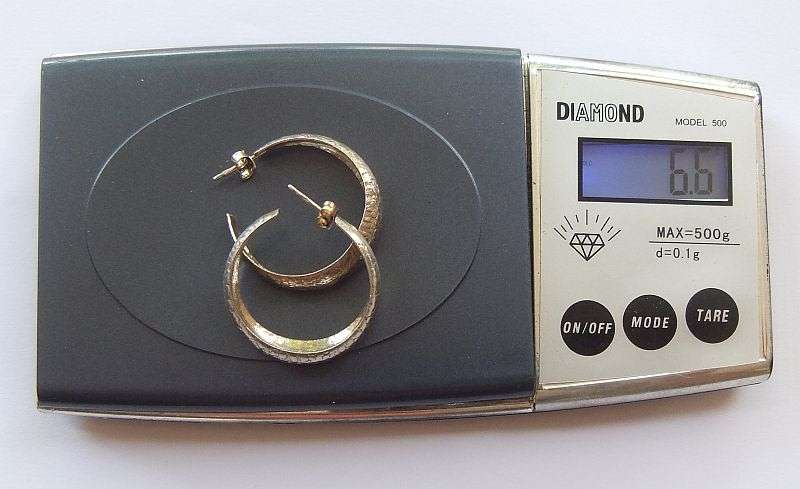 A STYLISH "BIGGISH" PAIR OF SOLID STERLING SILVER EARRINGS ...IN EXCELLENT CONDITION...MUST HAVE !!