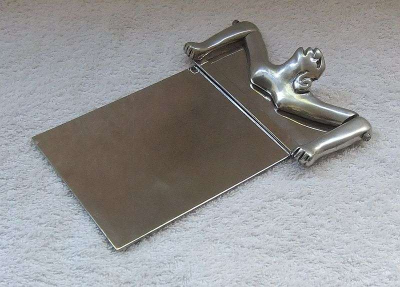 A TOTALLY COOL SA DESIGNER NOTEPAD HOLDER BY CARROL BOYES , CLEARLY MARKED AND IN GOOD CONDITION !!