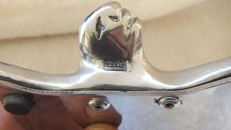 A TOTALLY COOL SA DESIGNER NOTEPAD HOLDER BY CARROL BOYES , CLEARLY MARKED AND IN GOOD CONDITION !!