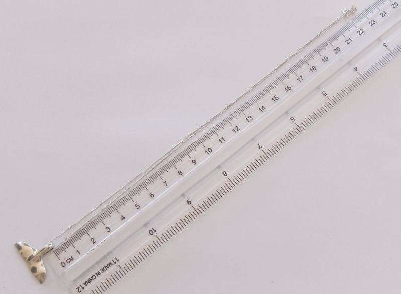 A VERY SOLID AND CHARMING STERLING SILVER "WHALE TAIL" PENDANT PLUS A 45CM STERLING SILVER NECKLACE