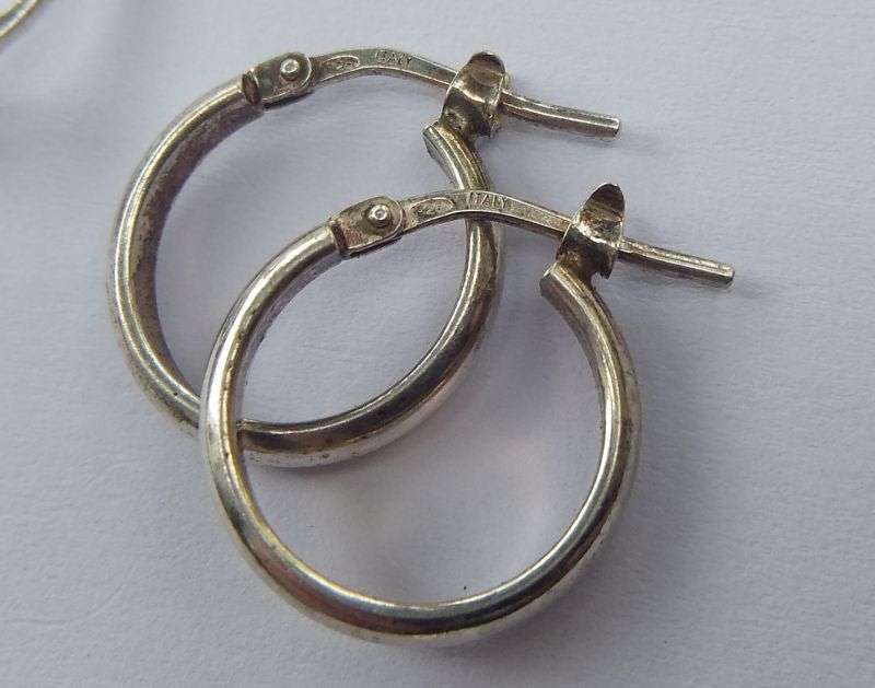 WHAT MORE !! A STERLING SILVER NECKLACE WITH TREE OF LIFE , AN ETERNITY RING PLUS SILVER EARRINGS !!