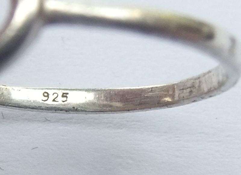 WHAT MORE !! A STERLING SILVER NECKLACE WITH TREE OF LIFE , AN ETERNITY RING PLUS SILVER EARRINGS !!